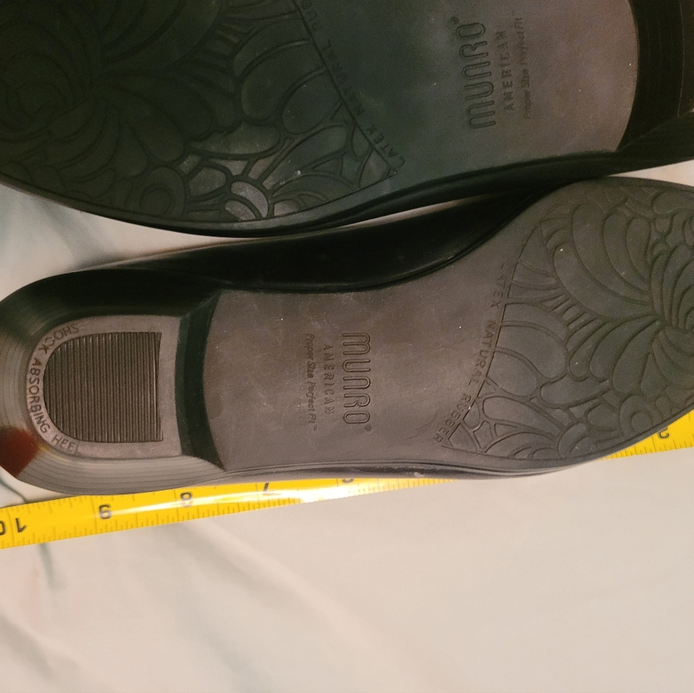Munro Black Heels approximately 6 1/2 but labeled size 7.  Please see tape